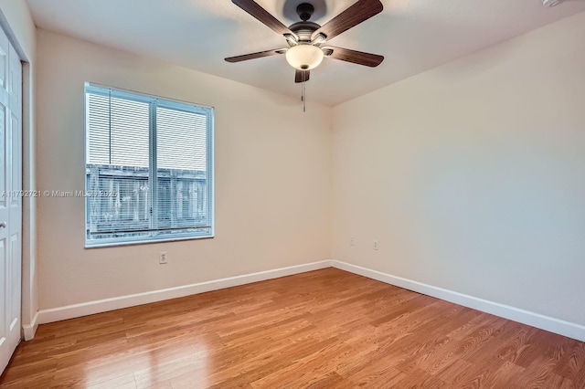 8857 SW 222nd Ter, Cutler Bay, FL 33190 - unfurnished room featuring baseboards, a ceiling fan, and light wood-type flooring