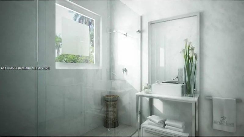 bathroom with walk in shower