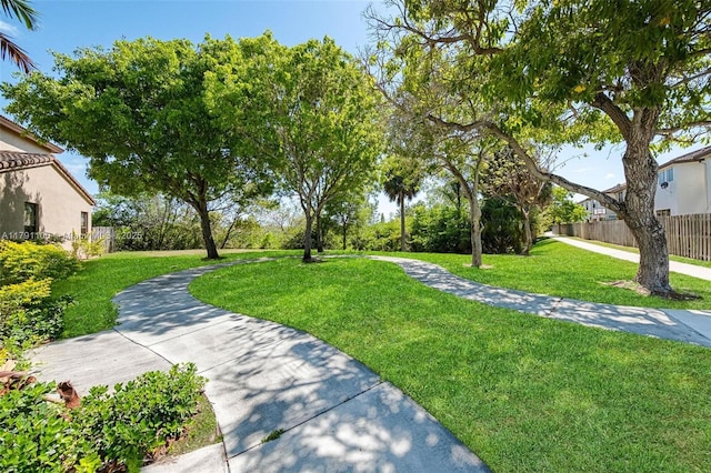 8904 SW 229th St, Cutler Bay, FL 33190 - exterior space featuring a lawn and fence