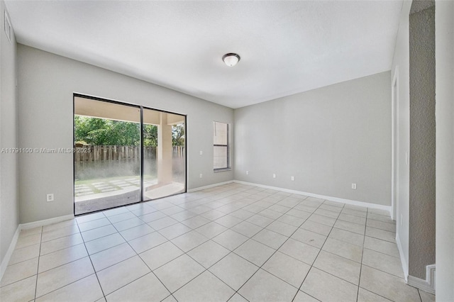 8904 SW 229th St, Cutler Bay, FL 33190 - unfurnished room with baseboards and light tile patterned flooring