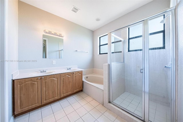 8904 SW 229th St, Cutler Bay, FL 33190 - bathroom featuring tile patterned floors, a shower stall, a sink, and a garden tub