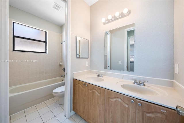 8904 SW 229th St, Cutler Bay, FL 33190 - bathroom with double vanity, visible vents, tile patterned flooring, a sink, and toilet