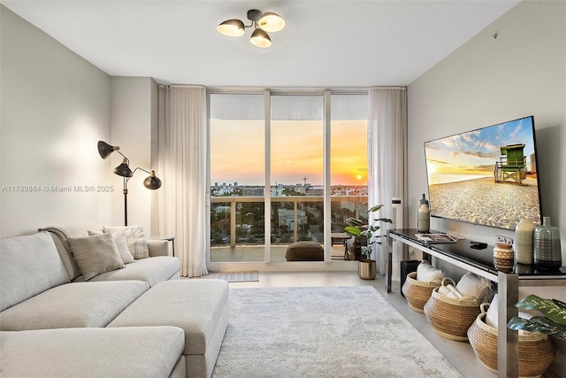 living room with floor to ceiling windows