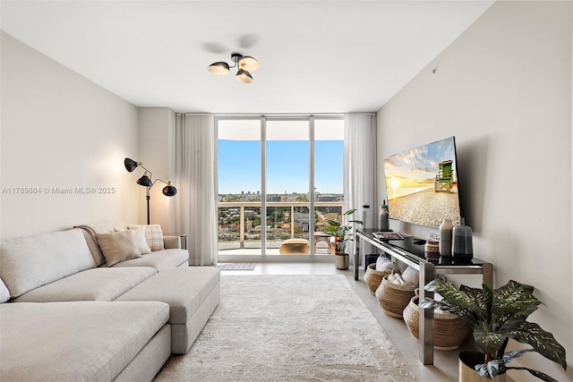 living area featuring a wall of windows