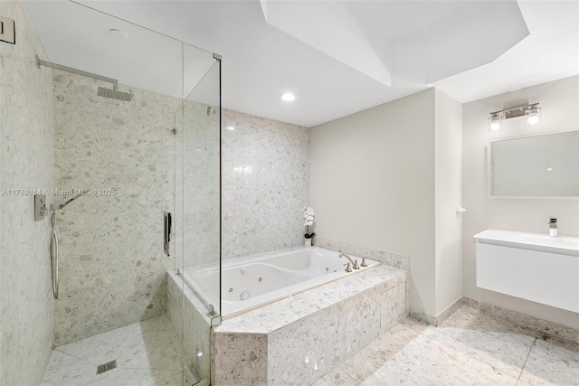 full bathroom featuring a jetted tub, a shower stall, tile patterned floors, vanity, and recessed lighting