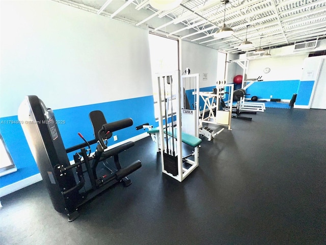 exercise room featuring visible vents