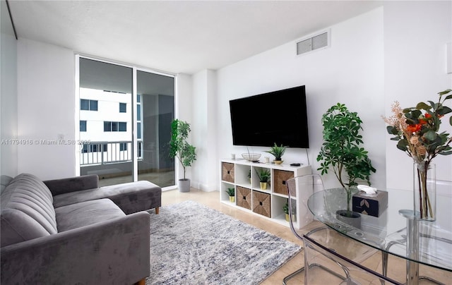 170 SE 14th St Unit 2708, Miami, FL 33131 - living room featuring visible vents