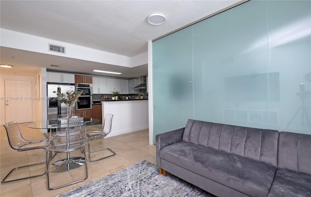 170 SE 14th St Unit 2708, Miami, FL 33131 - living area with visible vents and light tile patterned floors