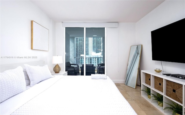 170 SE 14th St Unit 2708, Miami, FL 33131 - bedroom with floor to ceiling windows