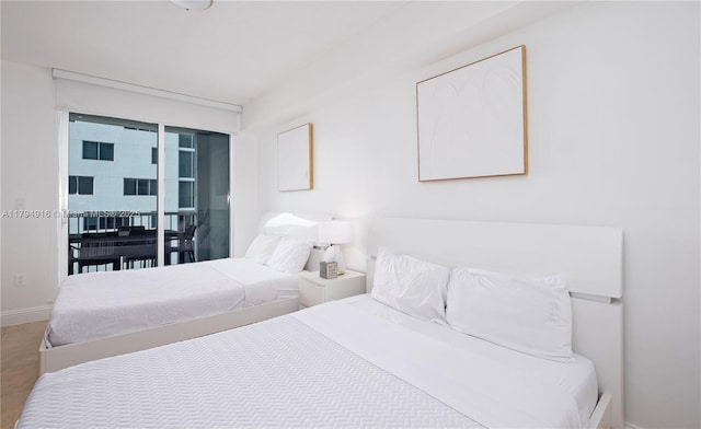 170 SE 14th St Unit 2708, Miami, FL 33131 - bedroom with baseboards