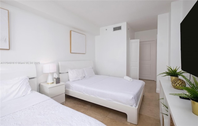 170 SE 14th St Unit 2708, Miami, FL 33131 - bedroom with visible vents and light tile patterned flooring