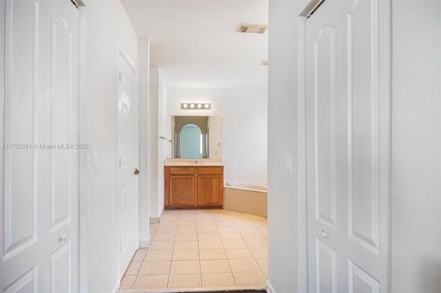 27056 SW 140th Pl, Homestead, FL 33032 - hall featuring light tile patterned floors
