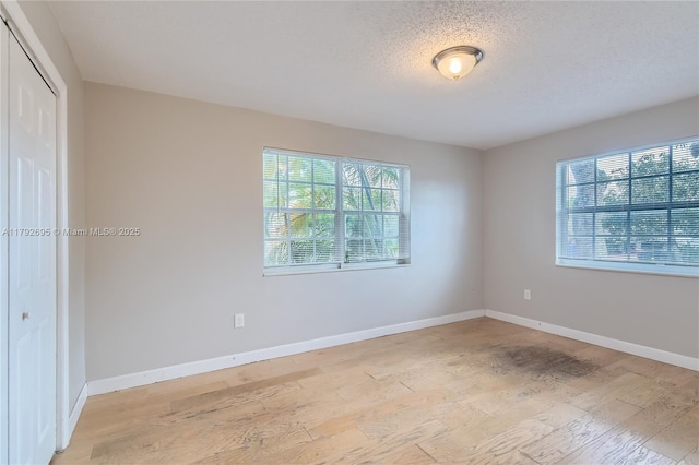7740 Shalimar St, Miramar, FL 33023 - unfurnished room featuring baseboards, a healthy amount of sunlight, and light wood finished floors