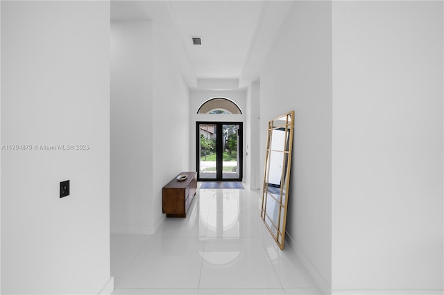 7745 SW 188th Ter, Cutler Bay, FL 33157 - hallway featuring light tile patterned floors, baseboards, and visible vents