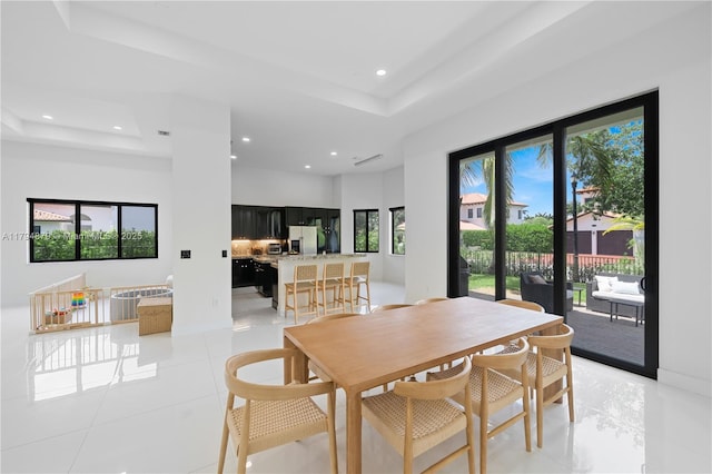 7745 SW 188th Ter, Cutler Bay, FL 33157 - dining area with a tray ceiling, visible vents, plenty of natural light, and recessed lighting