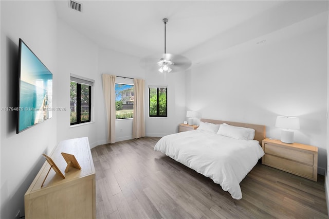 7745 SW 188th Ter, Cutler Bay, FL 33157 - bedroom featuring a ceiling fan, visible vents, wood finished floors, and baseboards