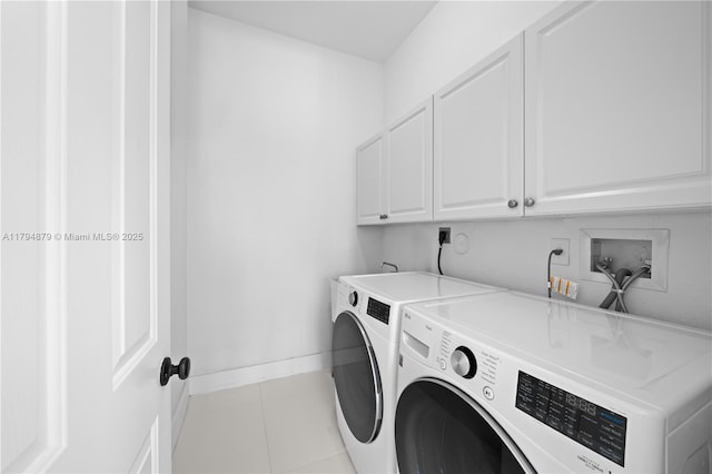 7745 SW 188th Ter, Cutler Bay, FL 33157 - laundry area with separate washer and dryer, cabinet space, and tile patterned flooring