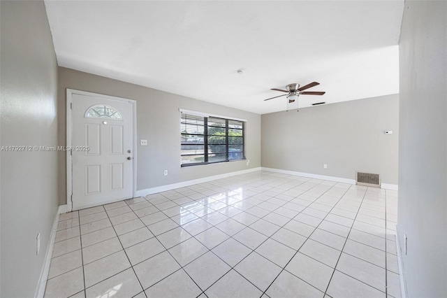 7817 NE Madeira St, Miramar, FL 33023 - foyer with baseboards, ceiling fan, visible vents, and light tile patterned floors