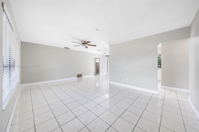 7817 NE Madeira St, Miramar, FL 33023 - empty room with a ceiling fan, baseboards, visible vents, and light tile patterned floors