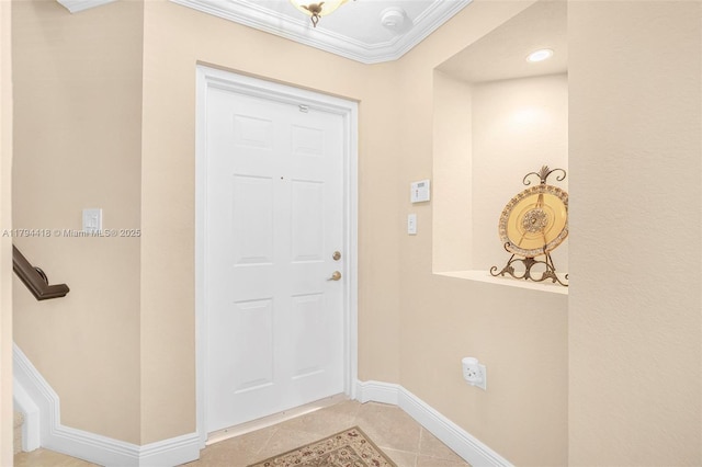 doorway with light tile patterned flooring, baseboards, and ornamental molding
