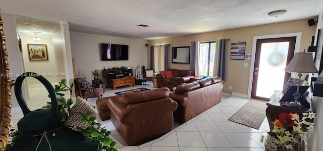 8111 SW 205th St, Cutler Bay, FL 33189 - living room featuring baseboards, visible vents, and light tile patterned floors