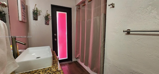 8111 SW 205th St, Cutler Bay, FL 33189 - full bath featuring a textured wall, wood finished floors, elevator, and curtained shower