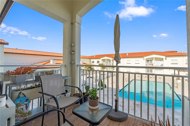 balcony featuring a residential view