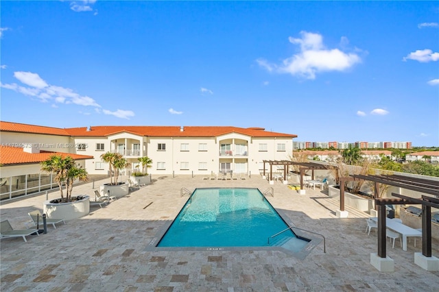 community pool featuring a patio area and a pergola