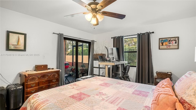 bedroom with access to outside, ceiling fan, and multiple windows