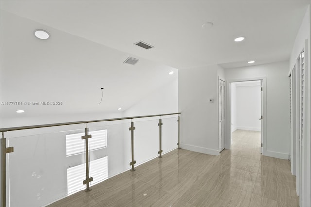 12894 SW 60th Ter, Miami, FL 33183 - hall featuring vaulted ceiling, recessed lighting, and visible vents