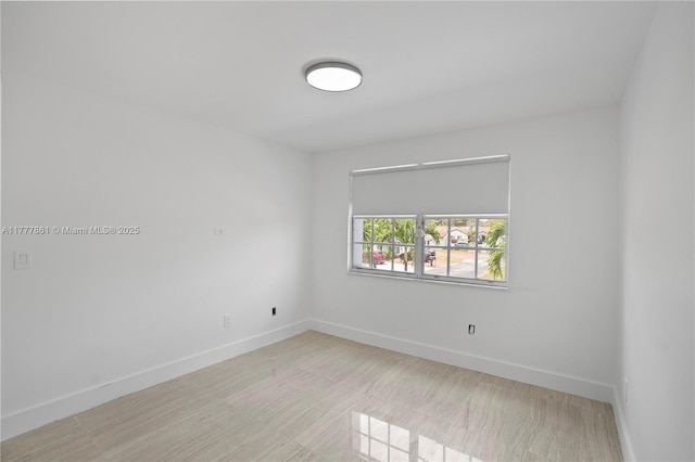 12894 SW 60th Ter, Miami, FL 33183 - unfurnished room featuring baseboards