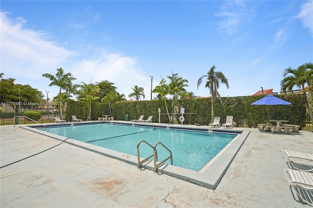 12894 SW 60th Ter, Miami, FL 33183 - pool with fence and a patio