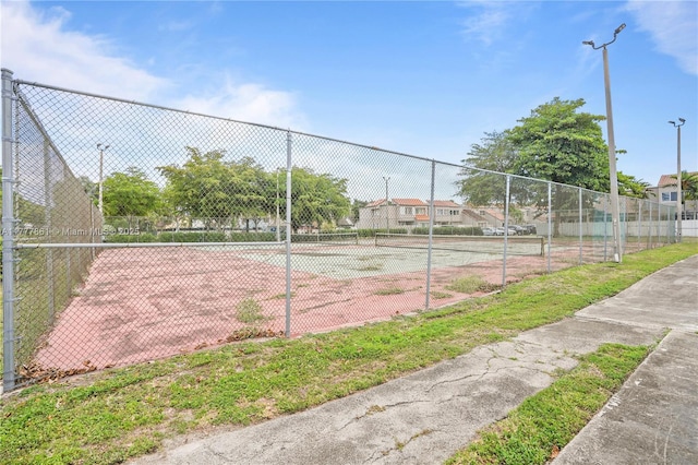 12894 SW 60th Ter, Miami, FL 33183 - view of tennis court with fence