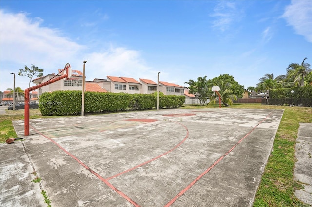 12894 SW 60th Ter, Miami, FL 33183 - view of basketball court featuring fence, community basketball court, and a residential view