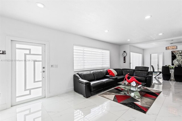 9365 SW 44th St, Miami, FL 33165 - living room featuring recessed lighting, marble finish floor, and baseboards
