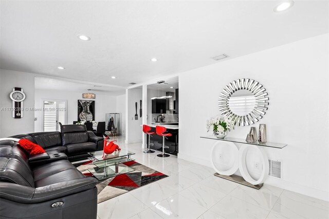 9365 SW 44th St, Miami, FL 33165 - living room featuring recessed lighting, baseboards, visible vents, and marble finish floor