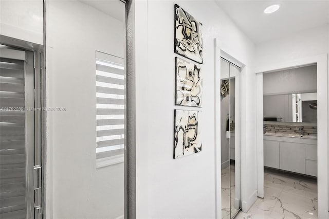 9365 SW 44th St, Miami, FL 33165 - hall featuring baseboards, recessed lighting, and marble finish floor