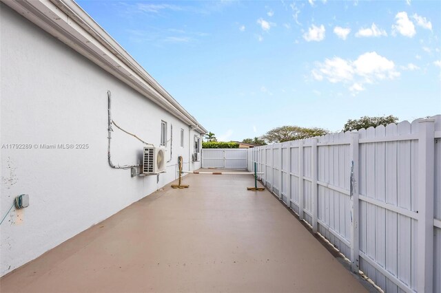 9365 SW 44th St, Miami, FL 33165 - view of patio / terrace featuring fence and ac unit