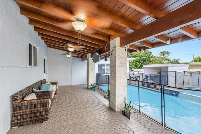 9365 SW 44th St, Miami, FL 33165 - view of patio / terrace with a fenced in pool, fence, and ceiling fan