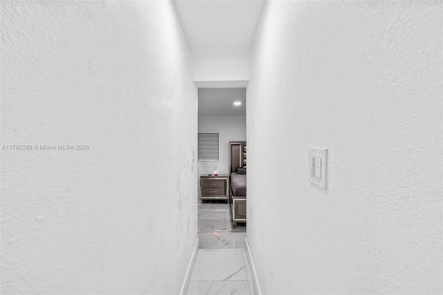 9365 SW 44th St, Miami, FL 33165 - hall with baseboards, marble finish floor, and a textured wall