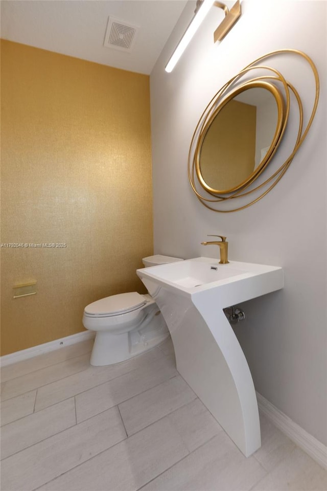 4317 Ficus St, Hollywood, FL 33021 - half bathroom with toilet and visible vents
