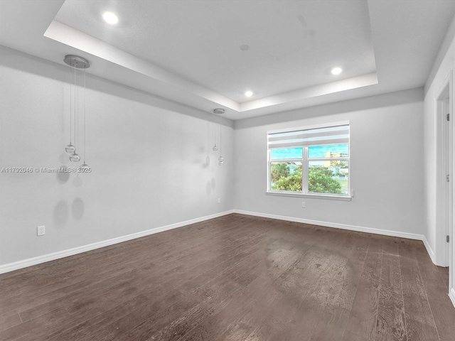 4317 Ficus St, Hollywood, FL 33021 - empty room with recessed lighting, a tray ceiling, dark wood finished floors, and baseboards