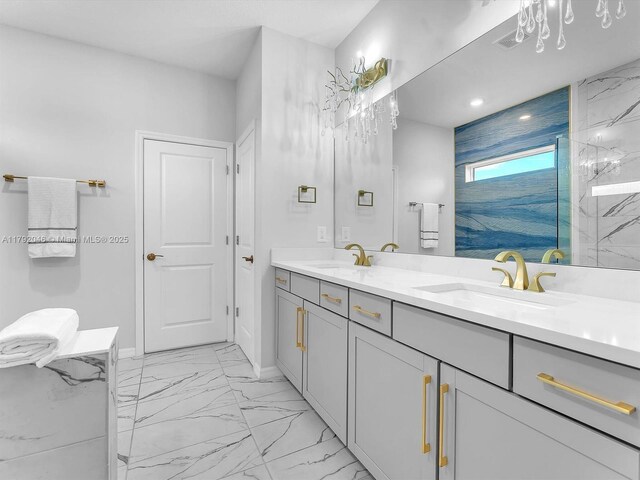 4317 Ficus St, Hollywood, FL 33021 - bathroom with double vanity, baseboards, a sink, and marble finish floor