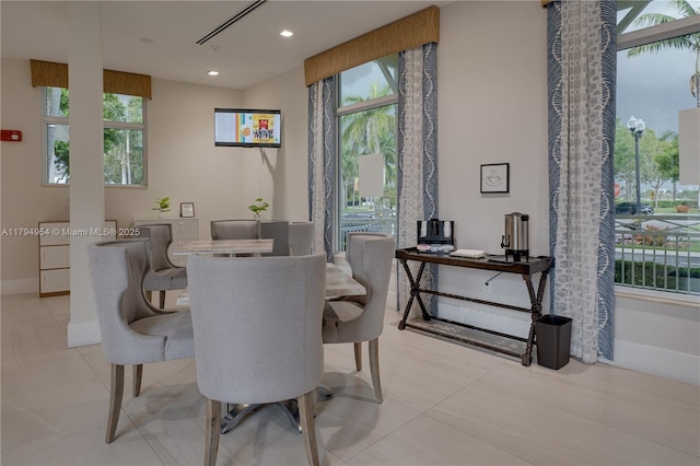 3064 SE 1st Dr Unit 3, Homestead, FL 33033 - tiled dining room with healthy amount of natural light, recessed lighting, and baseboards