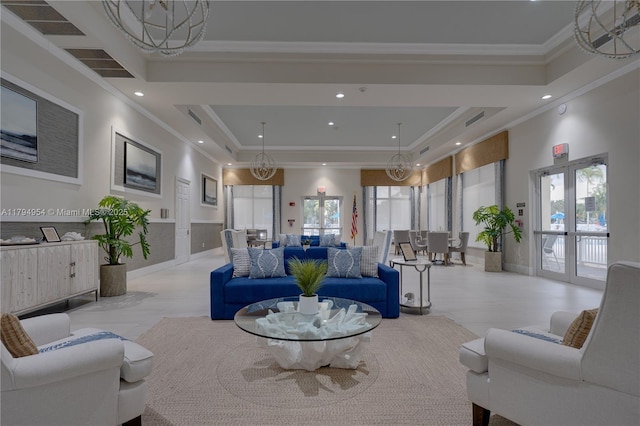 3064 SE 1st Dr Unit 3, Homestead, FL 33033 - living room featuring ornamental molding, recessed lighting, a raised ceiling, and healthy amount of natural light