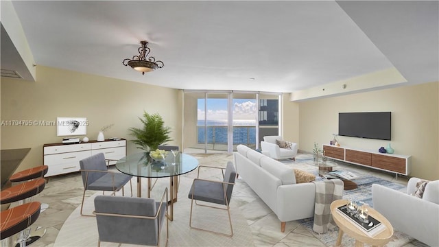 living room with a wall of windows and marble finish floor