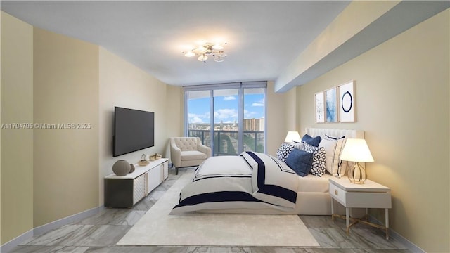 17201 Collins Ave Unit 1704, Sunny Isles Beach, FL 33160 - bedroom with baseboards, marble finish floor, and multiple windows