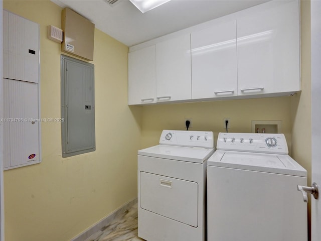 17201 Collins Ave Unit 1704, Sunny Isles Beach, FL 33160 - washroom with cabinet space, marble finish floor, baseboards, washer and clothes dryer, and electric panel