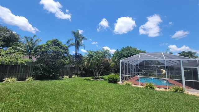 7640 NW 6th Ct, Plantation, FL 33324 - fenced backyard with an outdoor pool and a lanai
