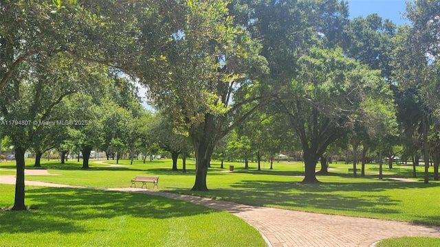 7640 NW 6th Ct, Plantation, FL 33324 - view of community featuring a lawn